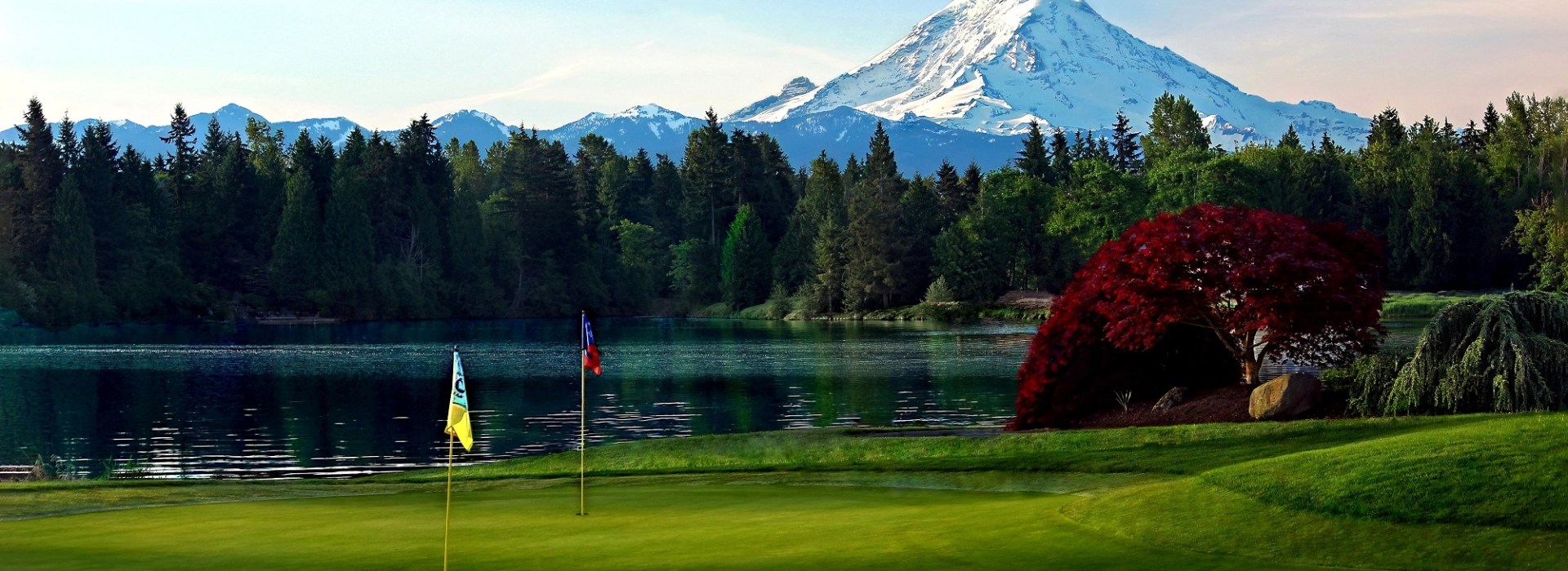 Golf course with mountain in distance
